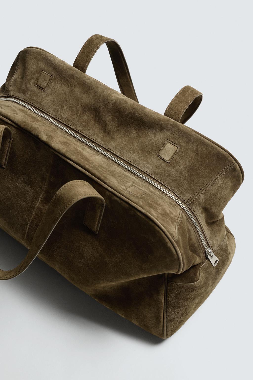 Medium leather travel bag